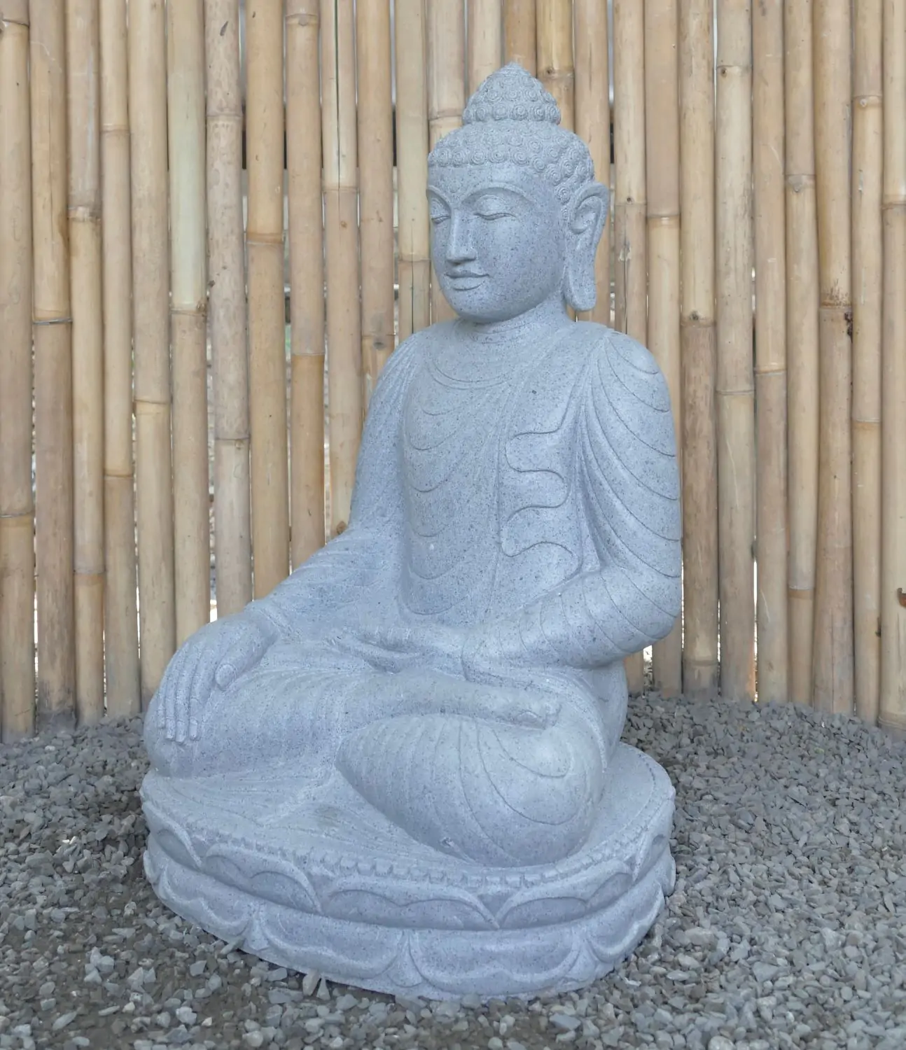  Product image 2 of the product “Seated Buddha made of Riverstone in Bhumisparsha - gesture of touching the earth. 82cm height. ”